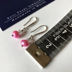 Earrings: Single pink pearl drop earrings