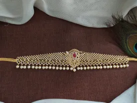 Embrace Duality With Gold-Plated Zircon Hip Chain with Ruby & Green Elegance