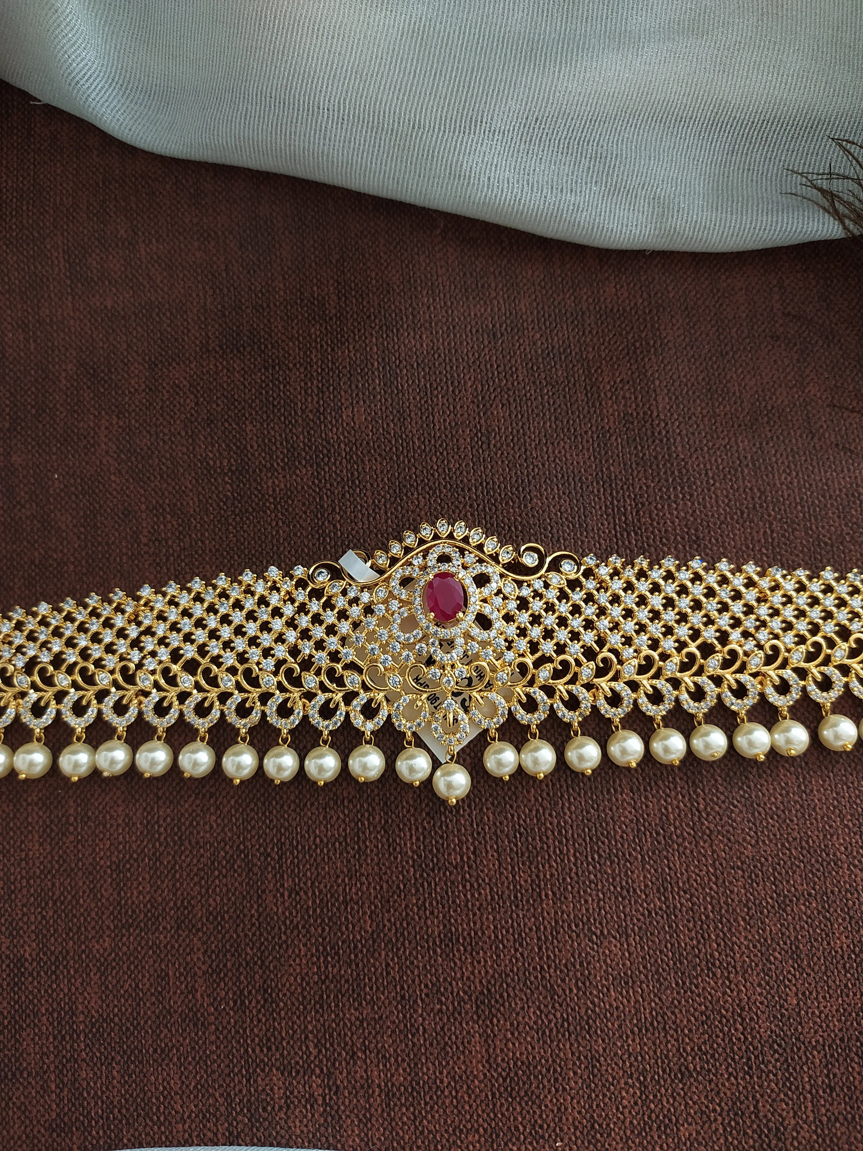 Embrace Duality With Gold-Plated Zircon Hip Chain with Ruby & Green Elegance